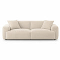 Divano in tessuto a coste beige con cuscini