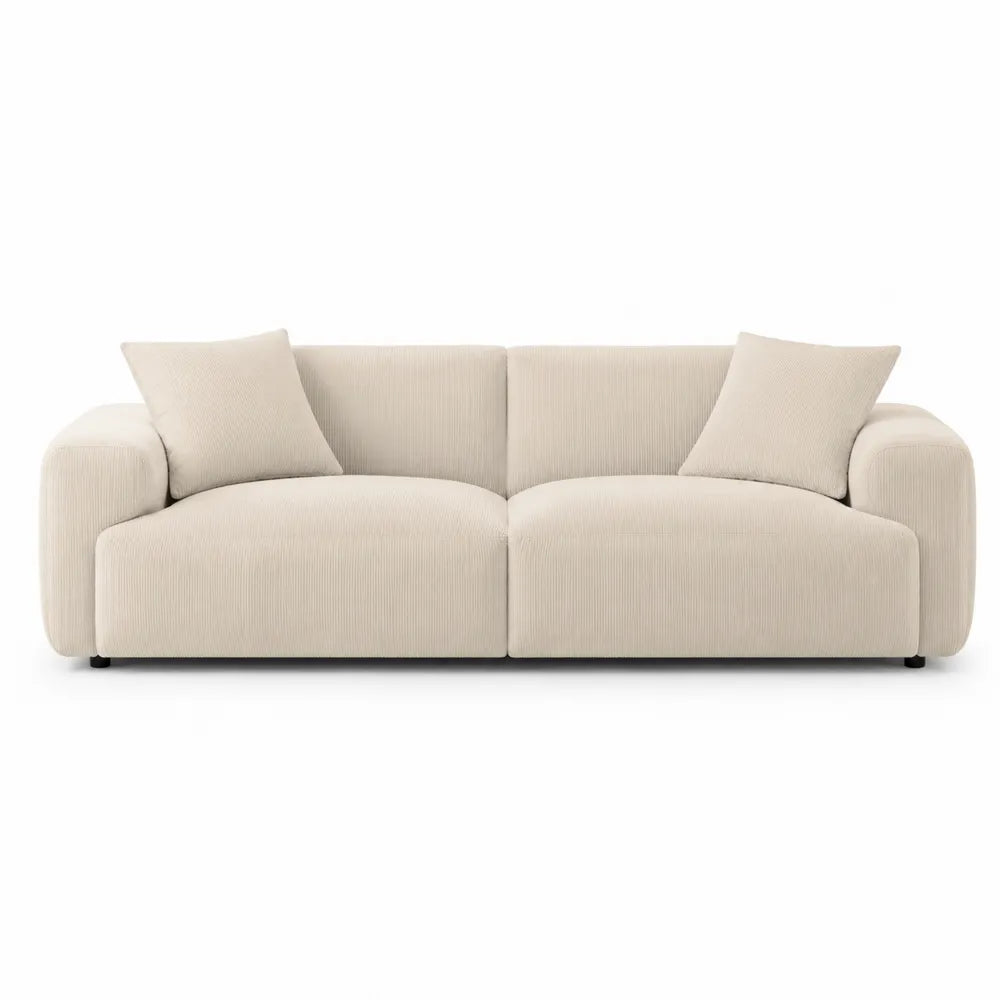Divano in tessuto a coste beige con cuscini