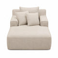 Divano in tessuto beige con cuscini inclusi